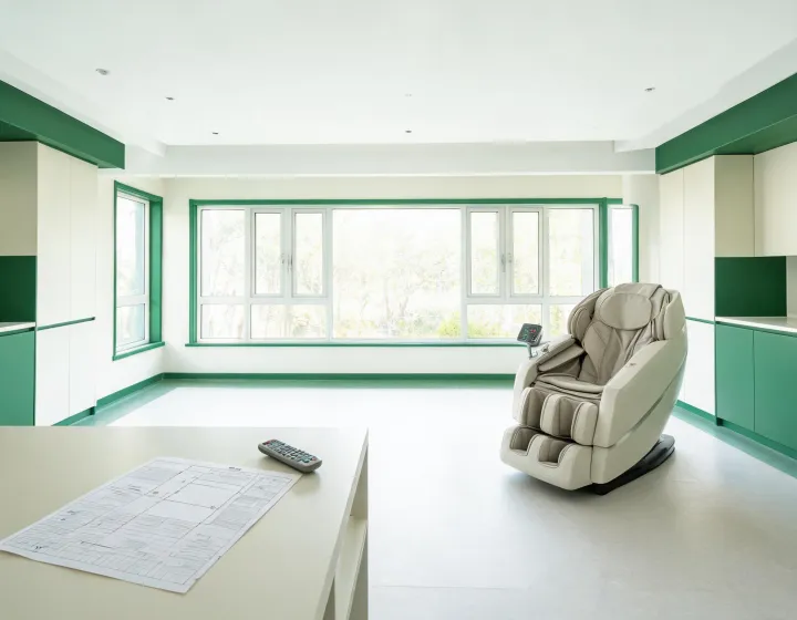 Massage chair and specification documents in a buyer review room